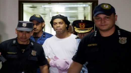 Judge rules Ronaldinho must remain in Paraguayan jail - Paraguayan Supreme Court, Asuncion, Paraguay - March 7, 2020? Ronaldinho handcuffed and escorted by police at the Supreme Court of Paraguay?REUTERS/Jorge Adorno