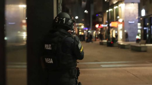 An Austrian policeman overlooks an area in Vienna on November 2, 2020, after a shooting in the city centre. - Multiple gunshots were fired in central Vienna on Monday evening, police said, while media reported that there had been an attack close to a synagogue. One attacker was "dead" and another "on the run", Austria's interior ministry said according to news agency APA. (Photo by Alex HALADA / AFP)