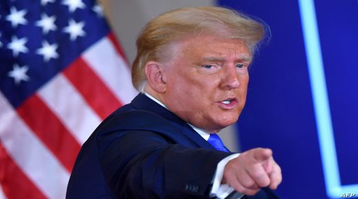US President Donald Trump gestures after speaking during election night in the East Room of the White House in Washington, DC, early on November 4, 2020. (Photo by MANDEL NGAN / AFP)