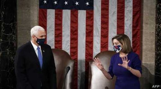 Speaker of the House Nancy Pelosi, D-CA, and Vice President Mike Pence officiate as a joint session of the House and Senate convenes to count the Electoral College votes cast in November's election, at the Capitol in Washington,DC on January 6, 2021. - Congress is meeting to certify Joe Biden as the winner of the 2020 presidential election, with scores of Republican lawmakers preparing to challenge the tally in a number of states during what is normally a largely ceremonial event. (Photo by J. Scott Applewhite / POOL / AFP)