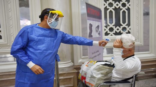 TUNIS, TUNISIA - 2020/06/27: A health worker checks the temperature of a passenger at Tunis-Carthage airport.
Tunisia reopened its land, sea and air borders for the first time in more than three months on Saturday after it announced it had brought the coronavirus outbreak under control. Some operations restarted at Tunis-Carthage airport, with flights to Rome, Geneva and Paris scheduled to depart. The government ended all restrictions on movement and businesses after Prime Minister Elyes Fakhfakh said on June 14 that Tunisia had won the battle against the spread of the virus. (Photo by Jdidi Wassim/SOPA Images/LightRocket via Getty Images)