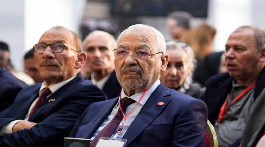 Islamist Ennahdha Party leader Rached Ghannouchi (C) attends the Truth and Dignity Commission (TDC) closing conference in the capital Tunis on December 14, 2018. - The Truth and Dignity Institute, set up in 2014 following the 2011 revolution with a mandate to "reveal the truth about the human rights violations" between 1955 and 2013, is to submit its recommendations to Tunisia's leadership on December 14-15 at a public event before the full report is submitted by December 31. (Photo by FETHI BELAID / AFP)