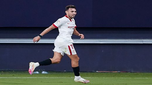 CADIZ, SPAIN - SEPTEMBER 27: Munir El Haddadi of Sevilla FC celebrates scoring his team's opening goal with team mates during the La Liga Santander match between Cadiz CF and Sevilla FC at Estadio Ramon de Carranza on September 27, 2020 in Cadiz, Spain. Football Stadiums around Europe remain empty due to the Coronavirus Pandemic as Government social distancing laws prohibit fans inside venues resulting in fixtures being played behind closed doors. (Photo by Fran Santiago/Getty Images)