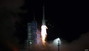 A Long March-2F carrier rocket, carrying the Shenzhou-13 spacecraft with the second crew of three astronauts to China's new space station, lifts off from the Jiuquan Satellite Launch Centre in the Gobi desert in northwest China early on October 16, 2021. - China launched a rocket carrying three astronauts to its new space station on what is set to be the country's longest crewed mission to date, state media Xinhua said, the latest landmark in Beijing's drive to become a major extraterrestrial power. (Photo by STR / AFP) / China OUT