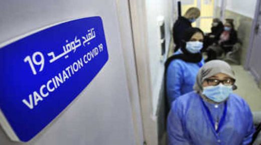Nurses wait in coridor of a vaccination center where Algerians get the COVID-19 vaccine, Wednesday, Feb.3, 2021 in Algiers. Algeria has started its vaccination campaign against the coronavirus pandemic last Saturday, using Russia's Sputnik V vaccine. (AP Photo/Fateh Guidoum)