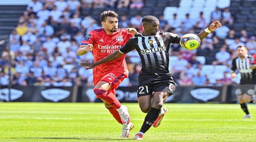 Lucas PAQUETA of Lyon and Mohamed Ali CHO of Angers during the French Ligue 1 Uber Eats soccer match between Angers and Lyon at Stade Raymond Kopa on August 15, 2021 in Angers, France. (Photo by Baptiste Fernandez/Icon Sport via Getty Images)