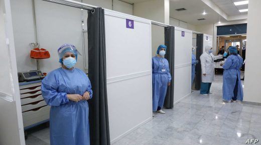 Members of the healthcare staff wait to administer the COVID-19 Pfizer/BioNTech vaccine at Lebanon's Rafik Hariri Hospital in the capital Beirut, on February 14, 2021, as the country kickstarts its inoculation campaign. - Lebanon gave its first COVID-19 vaccine dose to a doctor, as it started inoculation it hopes will keep the pandemic in check amid a deepening economic crisis. (Photo by ANWAR AMRO / AFP)