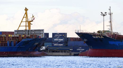 This picture taken on November 26, 2020 shows a view of container lying at the port of Sousse, about 140 kilometres south of Tunisia's capital, where containers of household waste from Italy are blocked from arriving to be buried in the North African country. - A shipment of hundreds of tonnes of household waste from Italy to Tunisia has raised suspicions of dirty dealings in a country that already struggles to manage its own refuse. The containers were imported in two shipments by Tunisian firm Soreplast, which claimed to have government permission to import and recycle industrial plastic scraps. (Photo by FETHI BELAID / AFP)