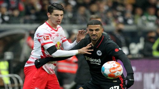 Leipzig's Hungarian midfielder Dominik Szoboszlai (L) and Frankfurt's German midfielder Aymen Barkok vie for the ball during the German first division Bundesliga football match Eintracht Frankfurt v RB Leipzig in Frankfurt am Main, western Germany, on October 30, 2021. - - RESTRICTIONS: DFL REGULATIONS PROHIBIT ANY USE OF PHOTOGRAPHS AS IMAGE SEQUENCES AND/OR QUASI-VIDEO (Photo by Daniel ROLAND / AFP) / RESTRICTIONS: DFL REGULATIONS PROHIBIT ANY USE OF PHOTOGRAPHS AS IMAGE SEQUENCES AND/OR QUASI-VIDEO (Photo by DANIEL ROLAND/AFP via Getty Images)