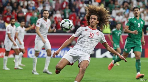 (FILES) This file photo taken on December 18, 2021 shows Tunisia's midfielder Hannibal Mejbri preparing to clear the ball during the FIFA Arab Cup 2021 final football match between Tunisia and Algeria at the Al-Bayt stadium in the Qatari city of Al-Khor. - The young Tunisian international footballer Hannibal Mejbri, one of the main players of the Carthage Eagles, has tested positive for Covid-19, four days before the opening of the Africa Cup of Nations (CAN) in Cameroon. (Photo by DENOUR / AFP)