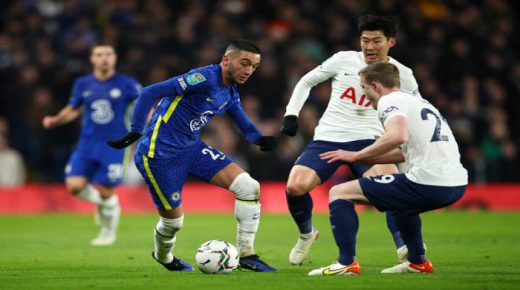 LONDON, ENGLAND - JANUARY 05: Hakim Ziyech of Chelsea is challenged by Oliver Skipp of Tottenham Hotspur during the Carabao Cup Semi Final First Leg match between Chelsea and Tottenham Hotspur at Stamford Bridge on January 05, 2022 in London, England. (Photo by Chris Lee - Chelsea FC/Chelsea FC via Getty Images)