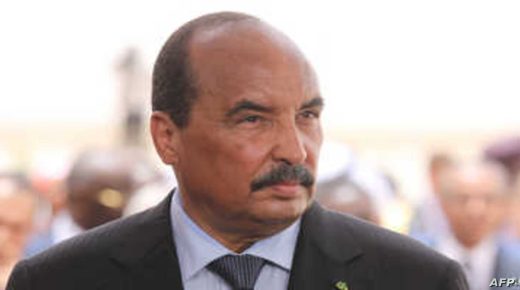 Mauritanian President Mohamed Ould Abdel Aziz waits for the arrival of the French President at Nouakchott airport on July 2, 2018. - The French President making an exceptional appearance at an African Union (AU) summit, was expected to discuss hurdles facing a five-nation French-backed anti-terror unit, the "G5 Sahel" force. African leaders are gathered in the Mauritanian capital for the final day of a summit overshadowed by security issues after jihadist rebels hammered two fragile Sahel states in successive attacks. (Photo by Ludovic MARIN / POOL / AFP)