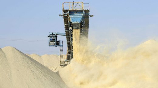 A picture taken on May 13, 2013 shows untreated phosphate being dropped off on a montain at the end of a conveyor belt at the Marca factory of the National Moroccan phosphates company (OCP/public), near Laayoune, the capial of Moroccan-controlled Western Sahara. As a global leader in the market for phosphate and its derivatives, OCP has been a key player in the international market since its founding in 1920, the worldís largest exporter of phosphate rock and phosphoric acid and one of the worldís largest fertilizer producers. AFP PHOTOS/FADEL SENNA / AFP PHOTO / FADEL SENNA