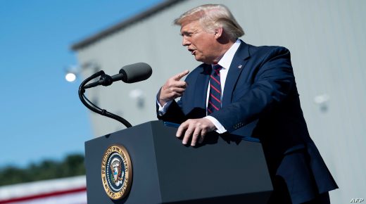 US President Donald Trump gestures as he speaks outside Mariotti Building Products in Old Forge, Pennsylvania, on August 20, 2020. (Photo by Brendan Smialowski / AFP)