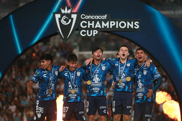 PACHUCA, MEXICO - JUNE 01: Elias Montiel of Pachuca, Alexei Dominguez of Pachuca, Alonso Aceves of Pachuca, Oussama Idrissi of Pachuca and Bryan Gonzalez of Pachuca celebrate in the medal ceremony after winning the 2024 Concacaf Champions Cup final match between Pachuca and Columbus Crew at Hidalgo Stadium on June 01, 2024 in Pachuca, Mexico. (Photo by Manuel Velasquez/Getty Images)