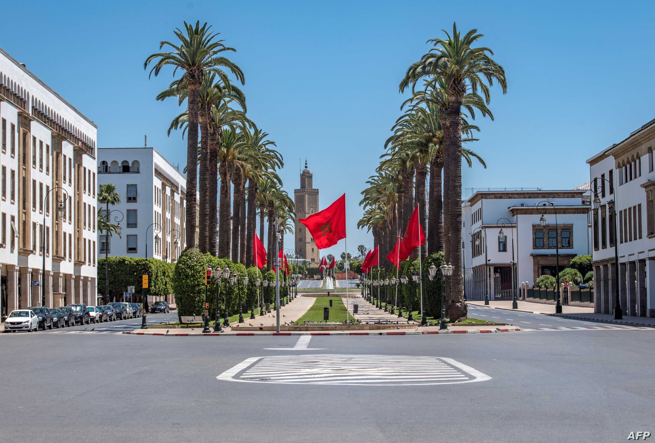 A picture taken on May 24, 2020 shows a deserted street in Rabat, as the country is under lockdown to stop the spread of the Covid-19 disease caused by the novel coronavirus, on the first day of the Eid al-Fitr feast marking the end of the Muslim holy month of Ramadan. (Photo by FADEL SENNA / AFP)