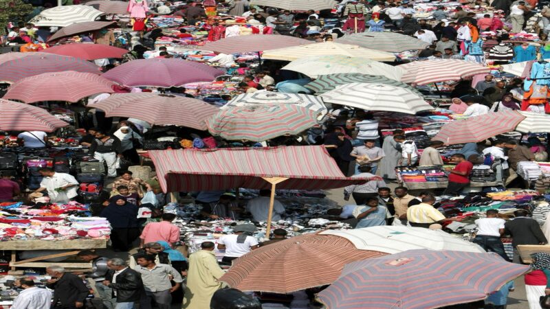 Egyptians crowd a popular market in Cairo on October 31, 2011. According to the United Nations, the global population will hit 7 billion on October 31. AFP PHOTO/MAHMUD HAMS (Photo credit should read MAHMUD HAMS/AFP/Getty Images)